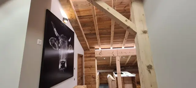 Rénovation électrique de combles aménagés sous charpente en bois